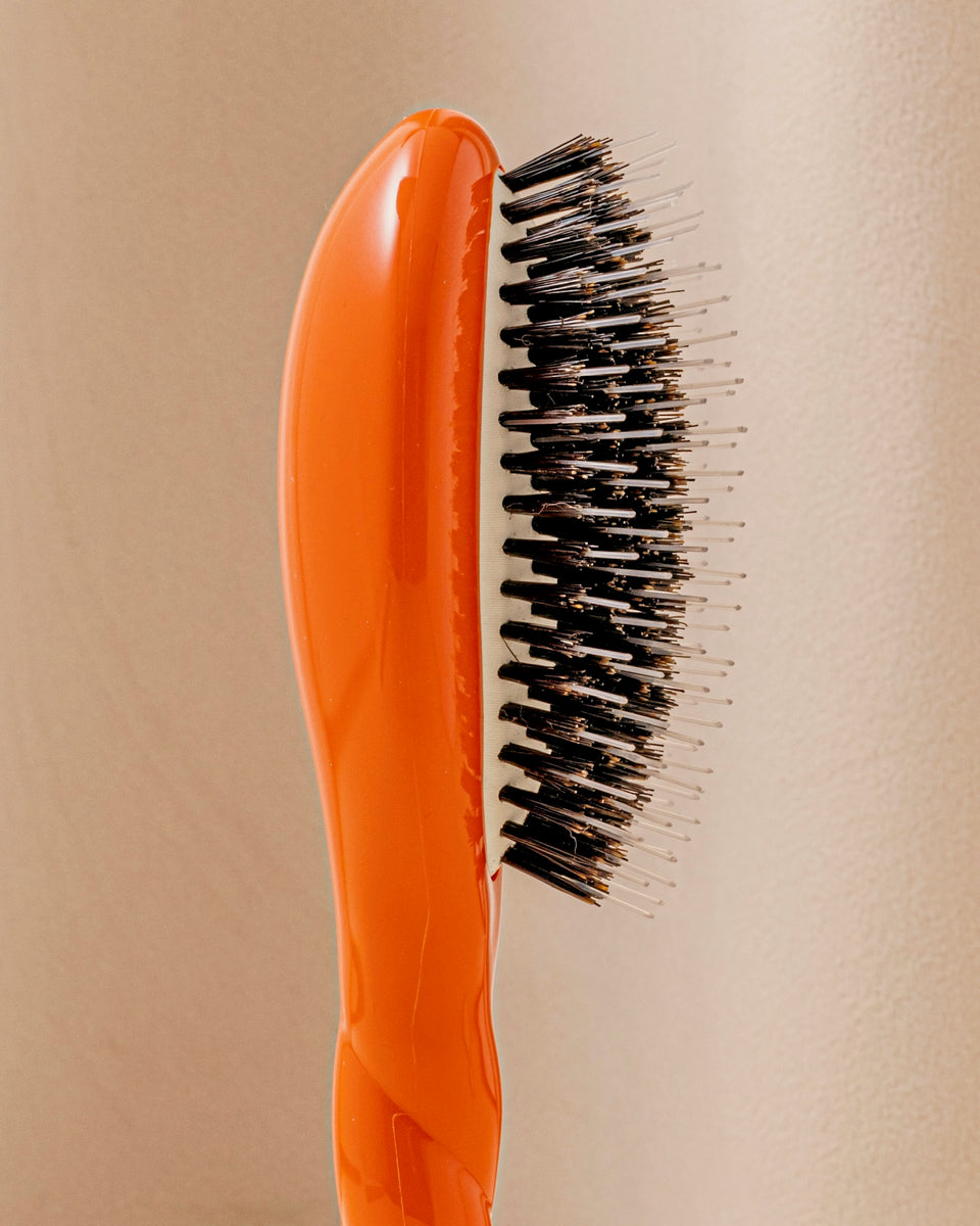 Limited Edition N.02 The Small Detangling Brush & Essential Care Orange Seventies