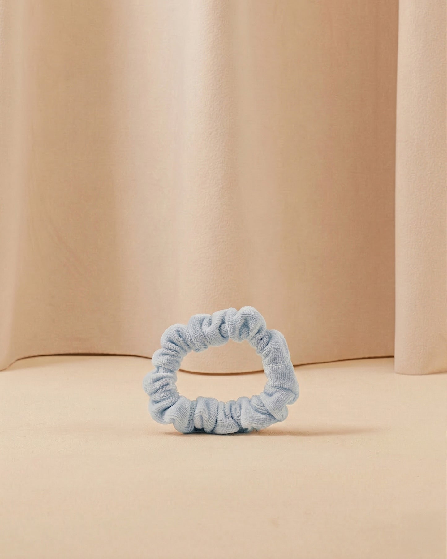 Das Mini-Haargummi, genannt Elastichou