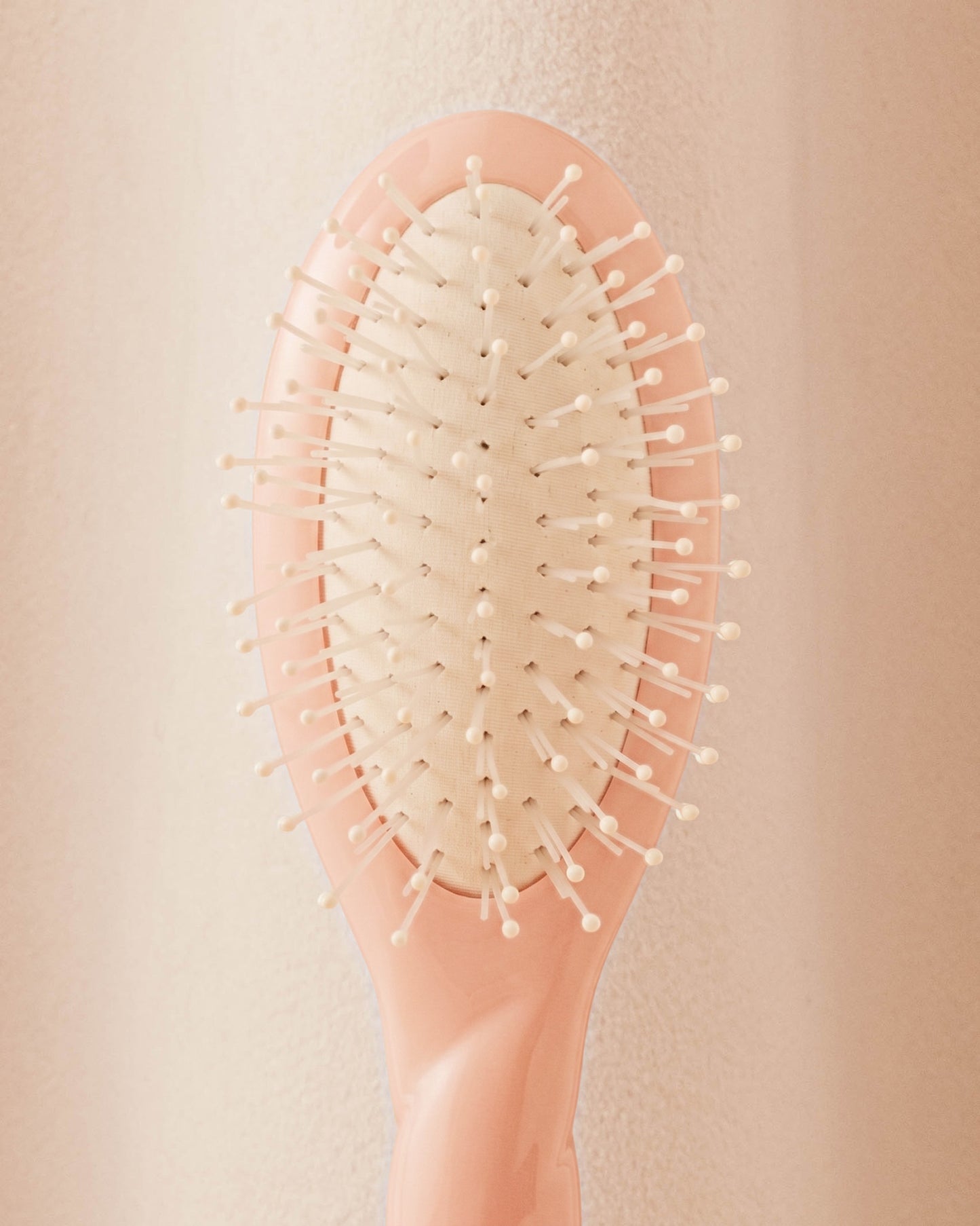 N.04 La Micro Brosse Démêlante & Massante La Miracle Rose Poudré