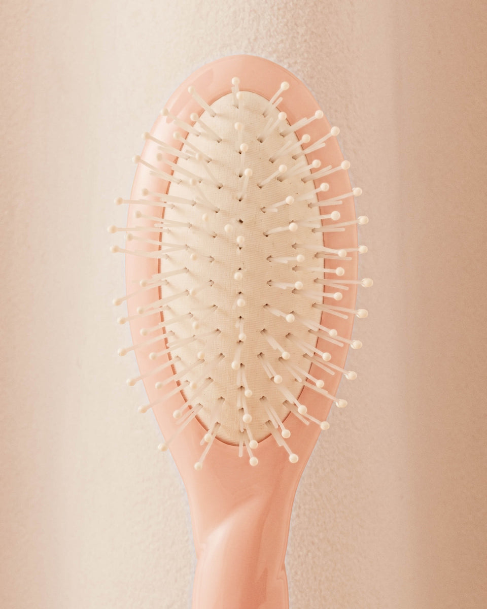 N.04 La Micro Brosse Démêlante & Massante La Miracle Rose Poudré