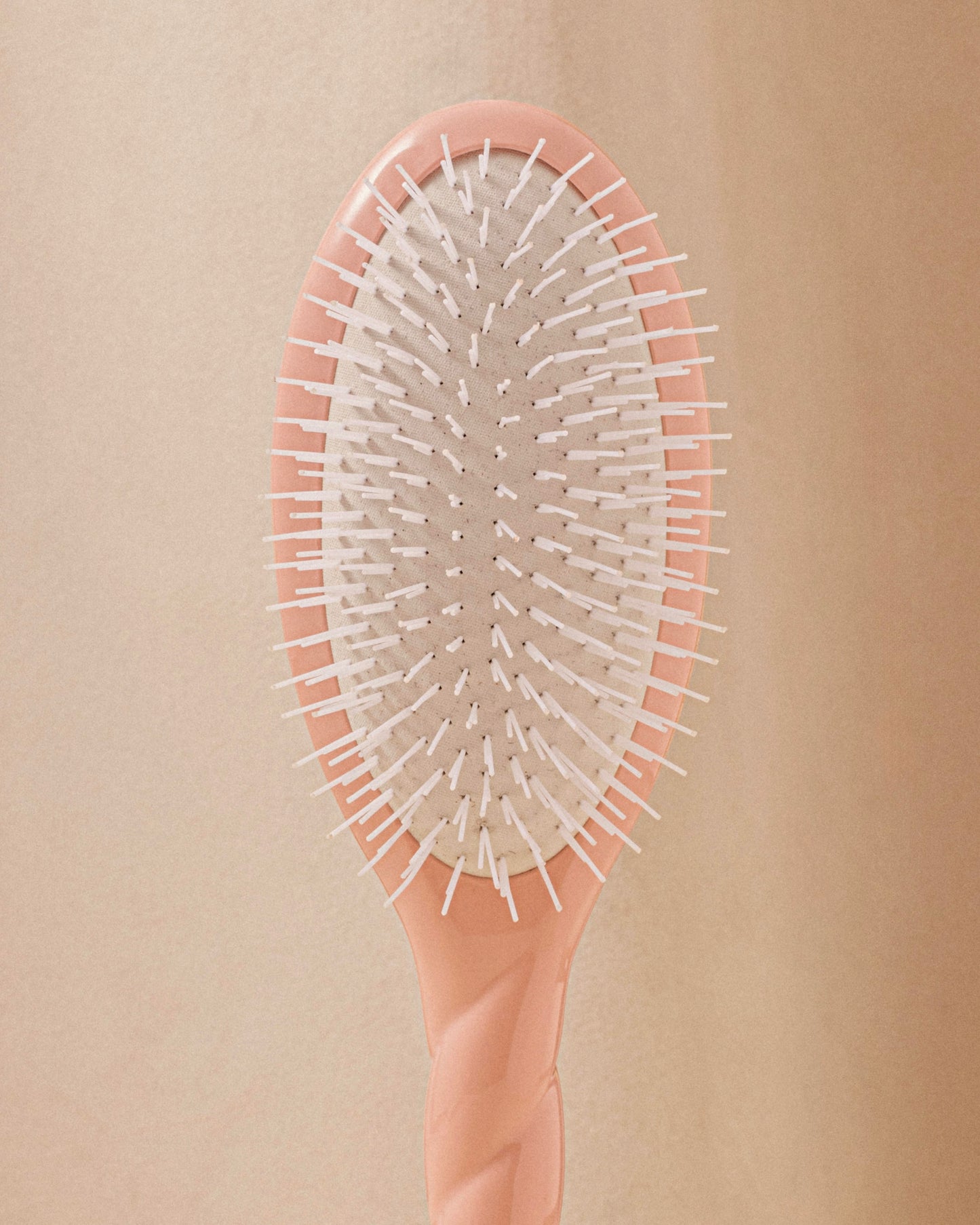 Trio: The Hairbrush, its Comb and its Powder Pink Pouch