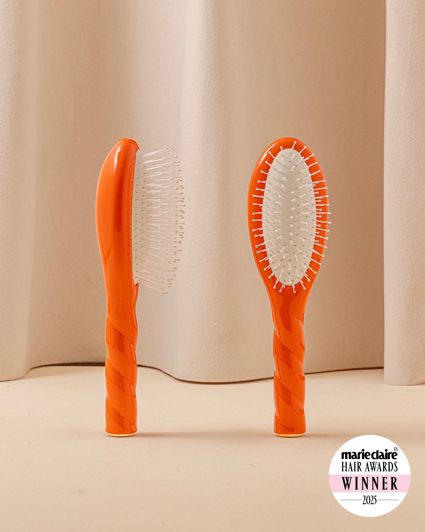 Édition Limitée N.04 La Petite Brosse Démêlante & Massante La Miracle Orange Seventies