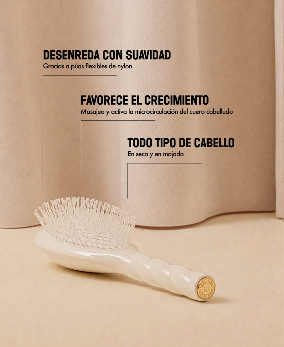 N.04 El Cepillo Desenredante y Masajeador La Miracle Blanco Crema