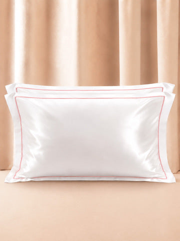 Le Set de 2 Taies d'Oreiller en Soie Rose Poudré