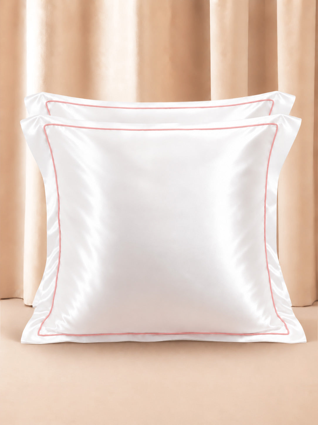 Le Set de 2 Taies d'Oreiller en Soie Rose Poudré