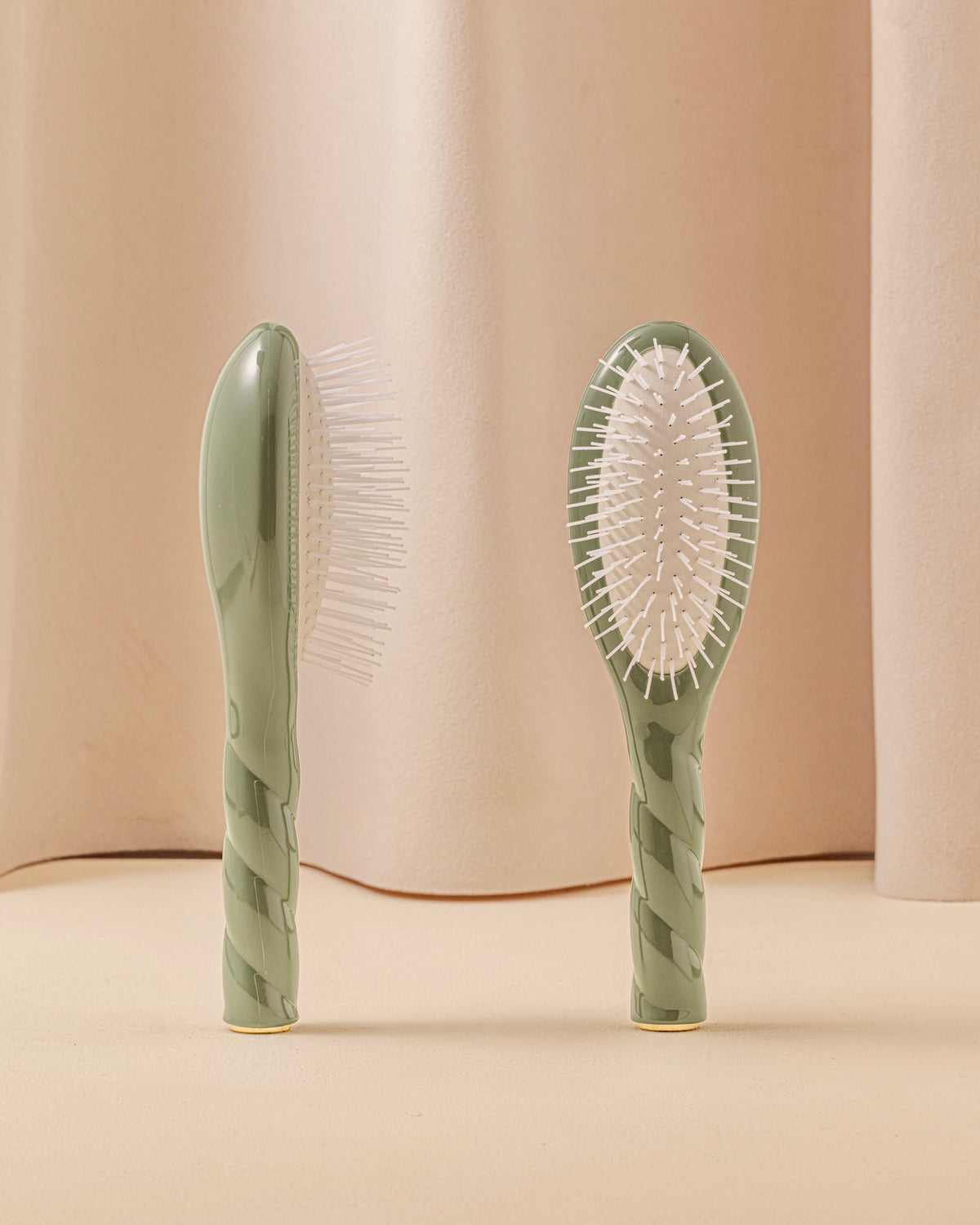 Trio: The Small Hairbrush, its Comb and Almond Green Pouch